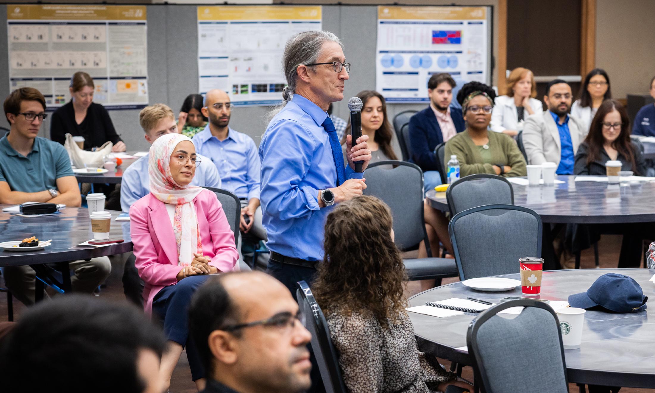 An image of Ken Mitton speaking during the event